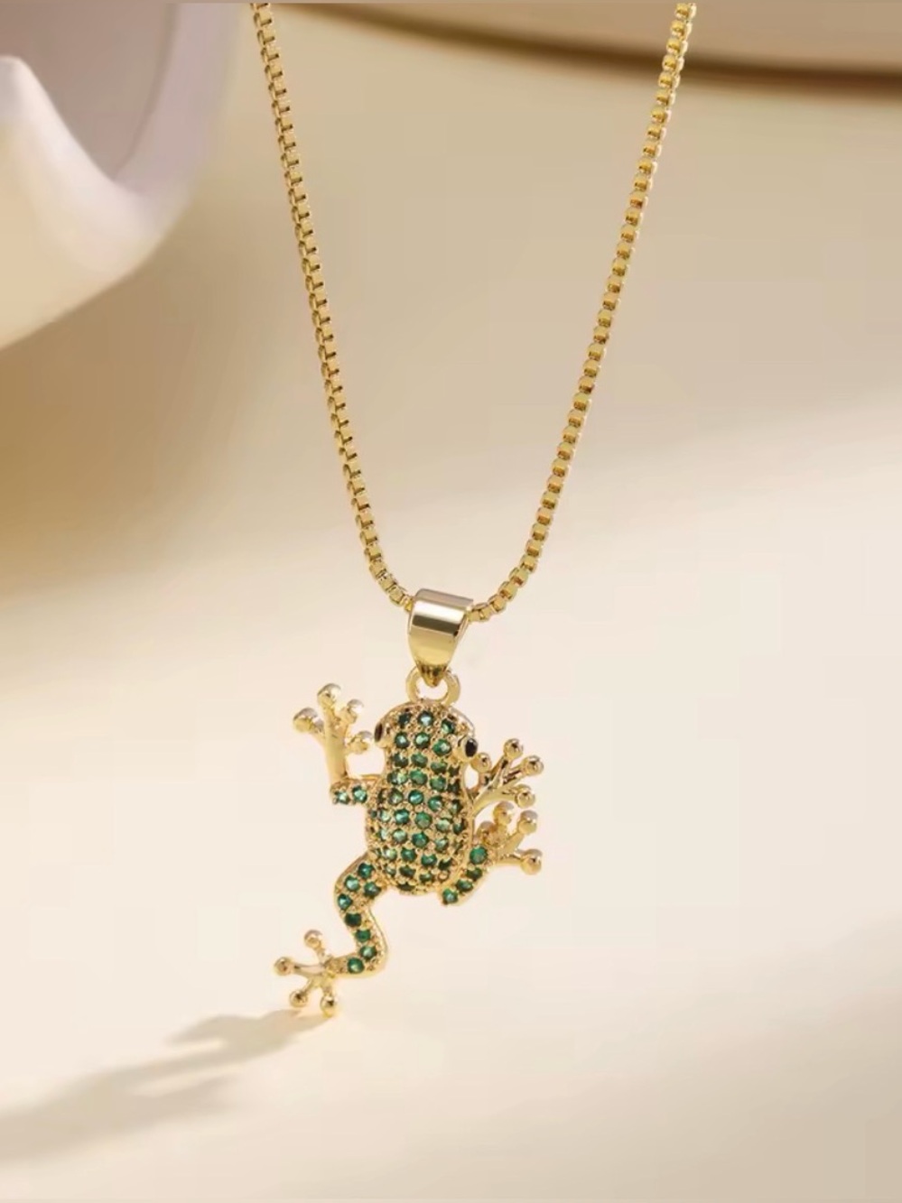 Gold Frog Pendant Necklace with Green Crystal Accents